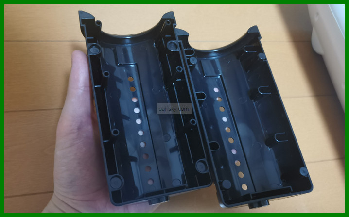 The A10 Piston's black plastic sleeve holder, opened