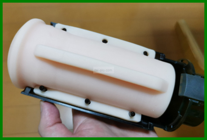 The sleeve set in the holder on its pins