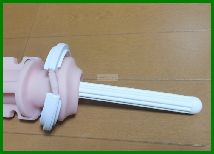 The sleeve with a white drying stick pushed inside