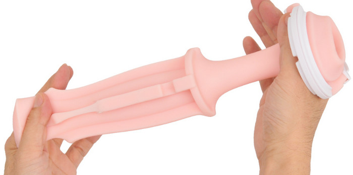 The official sleeve stretched out, showing the long pink body and the white ring