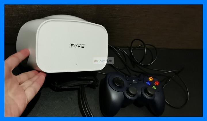 The FOVE VR headset and a game controller in a Kaikatsu Club booth