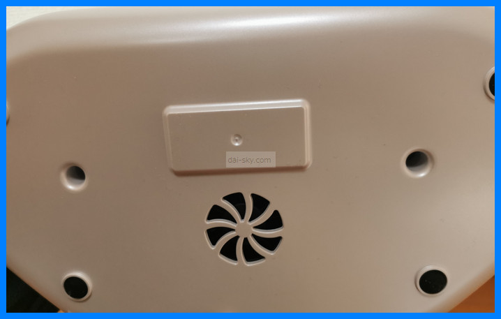 The fan vent on the underside of the cradle