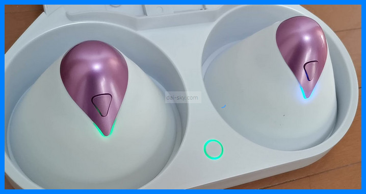 Both U.F.O. TW cups sitting in the cradle with their lights on